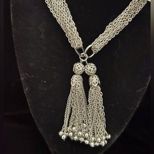 Long double tassel necklace with metal beads and multiple strands